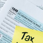 Balance Profit - Tax Documents on the Table