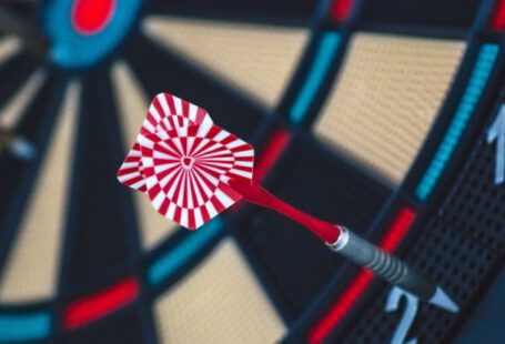 Business Goals - Red and White Dart on Darts Board