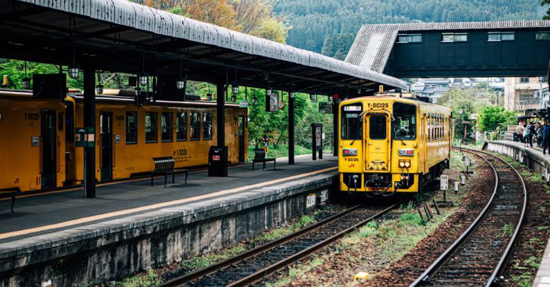 Creative Approaches - Bright aged train arriving at railway station