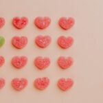 Individual Philanthropists - Heart shaped gumdrops on pink background