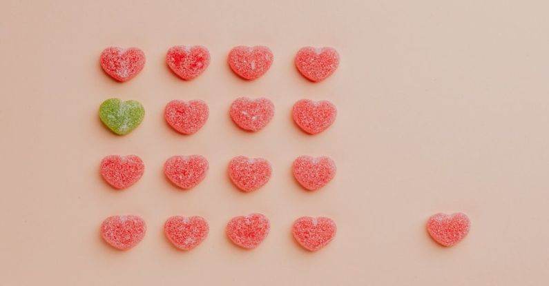 Individual Philanthropists - Heart shaped gumdrops on pink background