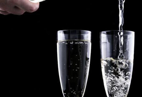 Benefit Events - Close-up of Beer Glass Against Black Background