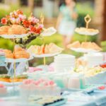 Fundraising Events - Various Desserts on a Table covered with Baby Blue Cover