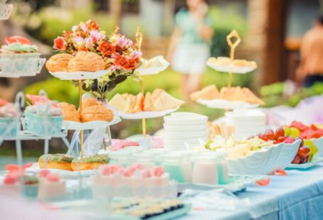 Fundraising Events - Various Desserts on a Table covered with Baby Blue Cover